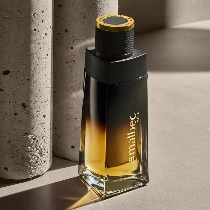 Malbec Gold flacon noir dégradé ambre sur fond sombre 100ml